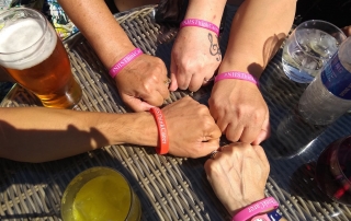 carers from Lifted showing off their "NHS Think Carer" wristbands