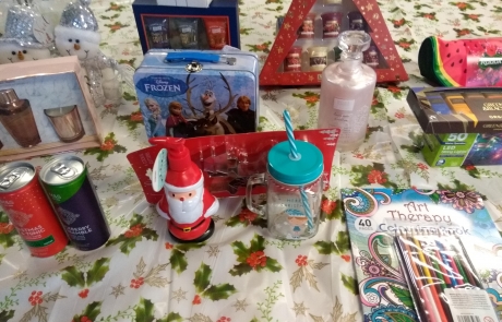 Prizes for Lifted's Christmas Bingo 2019 - includes Wickford & Co. votive candle set, Bayliss & Harding shower creme, Frozen Trumps pack with tin box, Gray's original Esquire shower gel set
