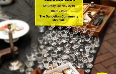 event details for Lifted's Tabletop Sale at The Dandelion Community Centre | background image: a table selling trinkets