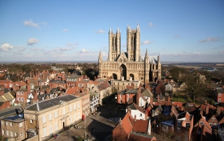 A view from across Castle Square and Exchequergate to the west front of the Cathedral from the top of the Castle Observatory Tower in Lincoln