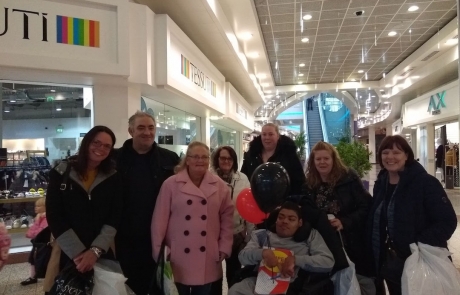 group photo of parent-carers at The Lowry Outlet Mall